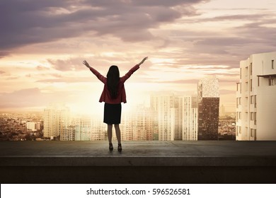 Attractive Asian Business Woman Standing On An Edge A Rooftop Looking City View