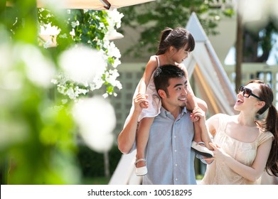 Attractive Asian Family Outdoor Lifestyle