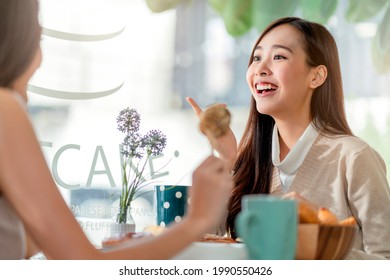 Attractive Asian Female Talking Good Positive Conversation To Friends With Smiling Laugh And Happiness Moment At Counter Near Window At Cafe With Daylight From Garden Positive Attitude Relationship