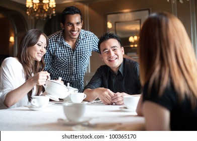 Attractive Asian Friends In Restaurant
