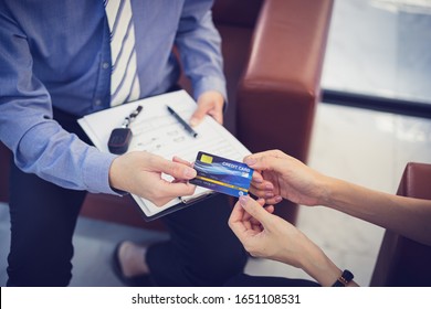 Attractive Asian Girl Millenials Buying A New Car With Credit Card. Film Effected