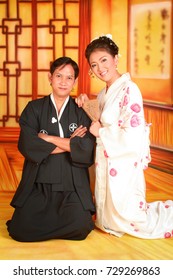 Attractive Asian Man And Woman Wearing Traditional Japanese Clothing 