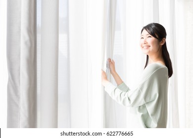 Attractive Asian Woman Bathing In The Sunlight