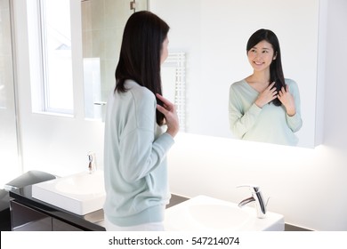 Attractive Asian Woman Beauty Image On Washroom