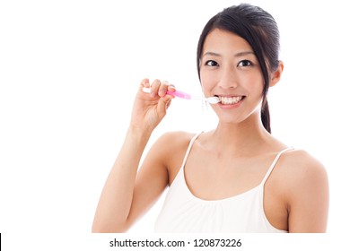 Attractive Asian Woman Brushing Teeth On White Background