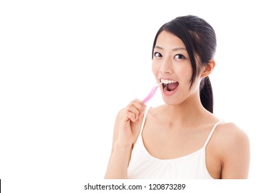 Attractive Asian Woman Brushing Teeth On White Background