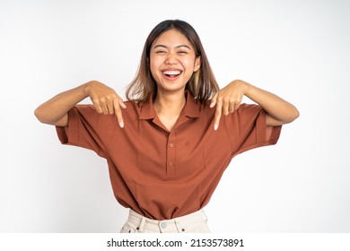 Attractive Asian Woman With Finger Pointing Down Hand Gesture On Isolated Background