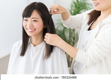 Attractive Asian Woman In Hair Salon