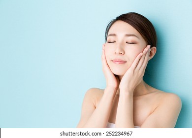 Attractive Asian Woman Skin Care Image On Blue Background