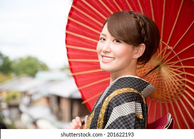 Attractive Asian Woman Wearing Traditional Japanese Kimono