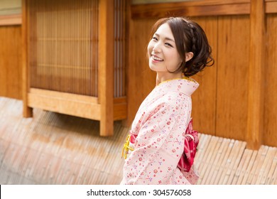 Attractive Asian Woman Wearing Traditional Japanese Kimono