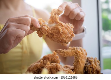 Attractive Asian Women Eating Fried Chicken