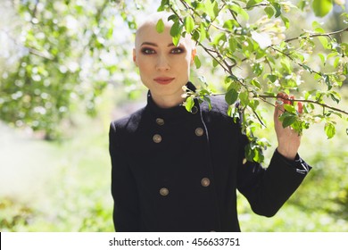 Attractive Bald Sexy Woman Walking In Forest. Outdoors Lifestyle Portrait Of Pretty Girl