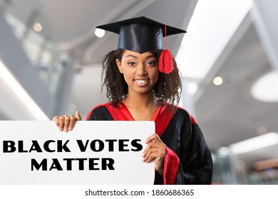 Attractive Black Activist Holding A Voter Suppression Sign