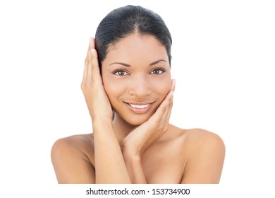 Attractive black haired model posing on white background