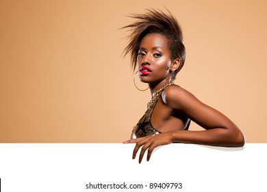 Attractive Black Woman Model Standing Behind Large White Banner Attractive Black Woman Model Standing Behind Large White Banner