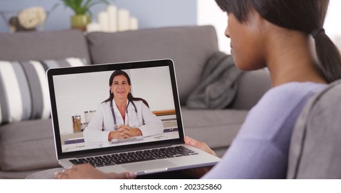 Attractive black woman smiling - Powered by Shutterstock