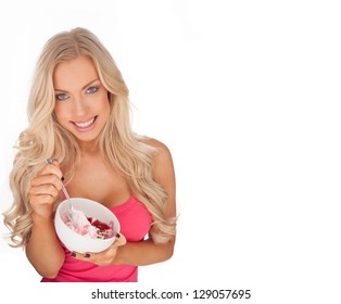 Attractive Blonde Caucasian Fit Young Woman Eating Ice Cream From A Ceramic Bowl