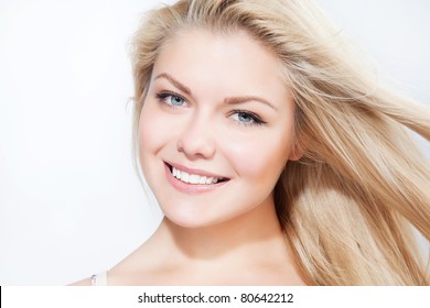 Attractive Blonde Smiling Woman Portrait On White Background