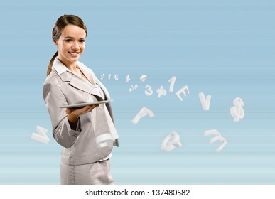 attractive business woman holding a tablet, Concept of digital technology