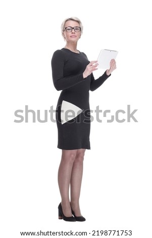 attractive business woman using her digital tablet.