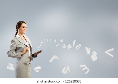 Attractive business woman is working with the tablet, Concept of digital technology