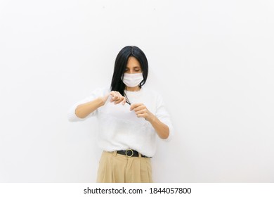 Attractive Caucasian Business Woman Tears White Envelope Isolated In White Background