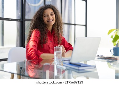 Attractive Cheerful Business Woman In Red Shirt Working On Laptop At Modern Office