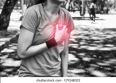 Attractive Confidence Asian Woman Runner Having A Heart Attack During A Run With Black And White Filter Look For Healthy Diet Lifestyle Training Panic Heart Pain Attack Blood Pressure Design Concepts