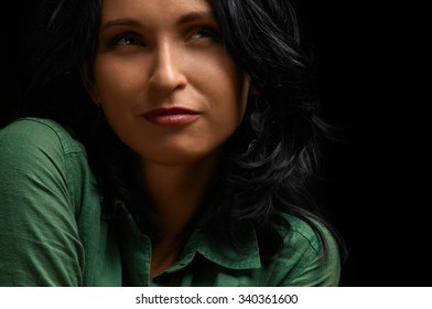 Attractive Confident Brunette Woman Portrait On Dark Background