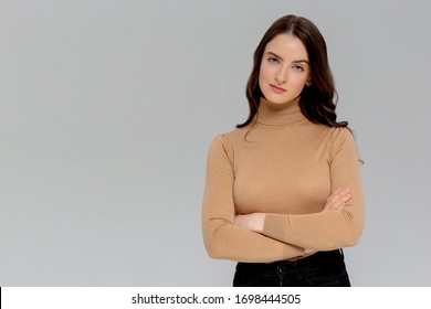 Attractive confident creative good-looking female bossy employee cross arms chest self-assured pose smiling assertive ready accomplish goals feeling lucky standing monochromatic background