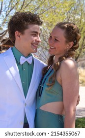 An Attractive Couple Posing For Pictures Before Their Senior Prom In Glenwood Springs, Colorado.