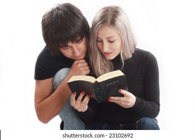 Attractive Couple Reading The Bible