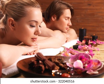 Attractive Couple Relax At The Spa Salon. Beauty Treatment Concept.