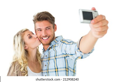 Attractive Couple Taking A Selfie Together On White Background