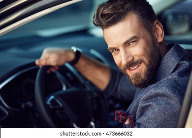 Attractive Elegant Happy Man In Good Car