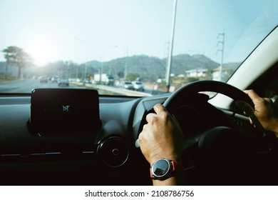 Attractive Elegant Man Asia In Business Suit Driving A Car