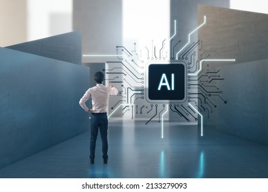 Attractive European Businessman Standing In Concrete Interior With Abstract Micro Chip. AI And Technology Concept