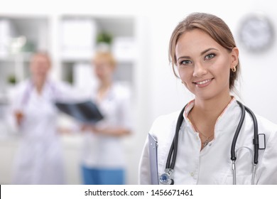 Attractive Female Doctor Front Medical Group Stock Photo 1456671461 ...