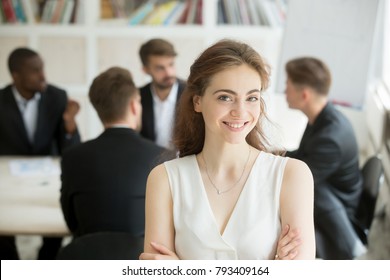 Attractive Female Leader Standing With Arms Crossed In Front Of Male Executive Team Meeting, Smiling Businesswoman Looking At Camera, Friendly Woman Boss, Assistant Or Hr Manager Headshot Portrait