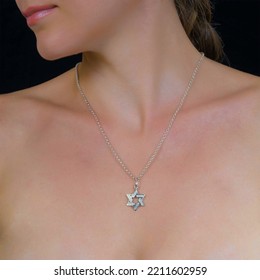 Attractive Female Silver Chain With Pendant Hangs Around Neck Of A Young Girl. Jewelry Photo For E Commerce, Online Sale, Social Media.