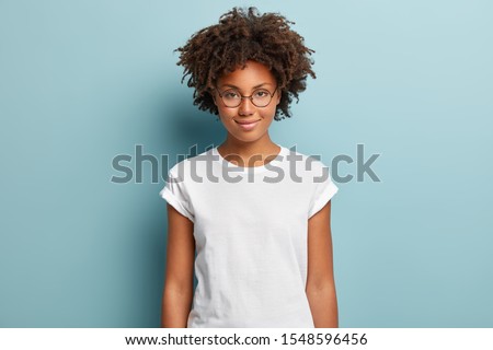 Image, Stock Photo Black woman, afro hairstyle, on roller skates riding outdoors on urban bridge with open arms.