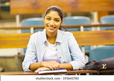 Attractive Female University Student In Lecture Hall