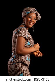 Attractive Ghanese African Woman Showing A Dance In Her Traditional National Costume