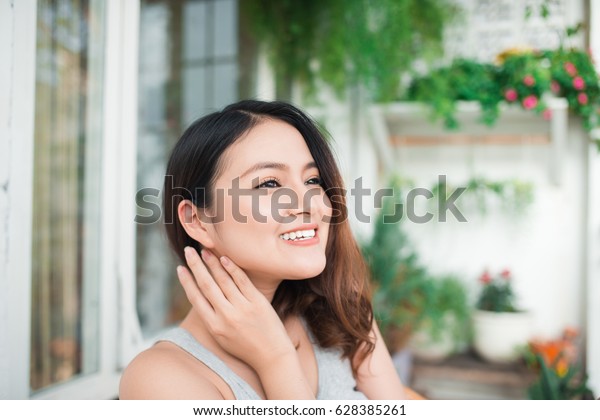 Attractive Girl Black Hair Sitting On Stock Photo Edit Now 628385261