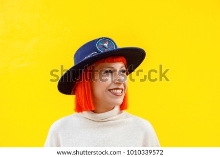 Similar – Attractive girl with a hat over a yellow wall