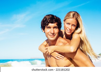 Attractive Good Looking Couple On Beautiful Sunny Beach 