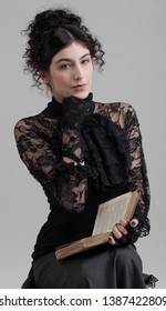 Attractive Gothic Victorian Girl Reading Spell Book