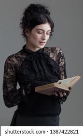 Attractive Gothic Victorian Girl Reading Spell Book