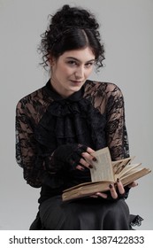 Attractive Gothic Victorian Girl Reading Spell Book